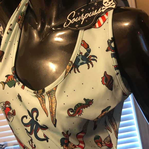 Tattooed diver - Picture 2 of 3